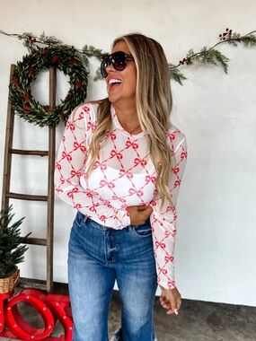Sheer White Long-Sleeve Top with Red Bow Print